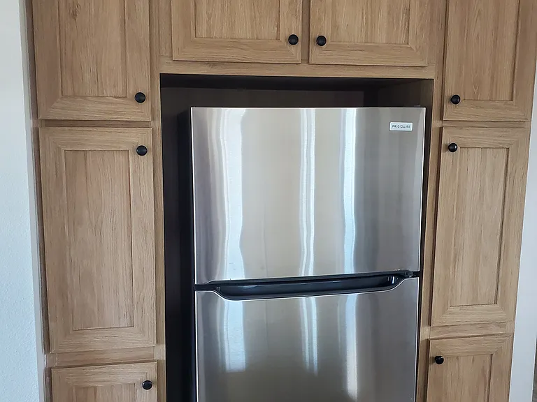 STAINLESS STEEL REFRIGERATOR AND LOTS OF STORAGE!