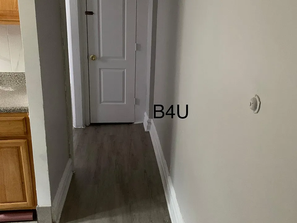 HALLWAY LEADING TO LIVING ROOM