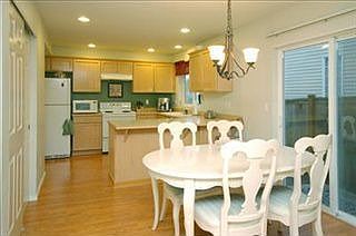 Large kitchen, lots of storage, new laminate floor and refrigerator.
