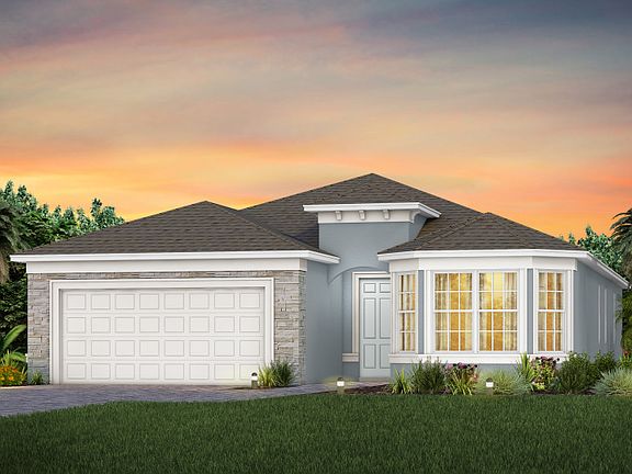 The Mystique, a one-story single family home with a 2 car garage, shown as home exterior FM3
