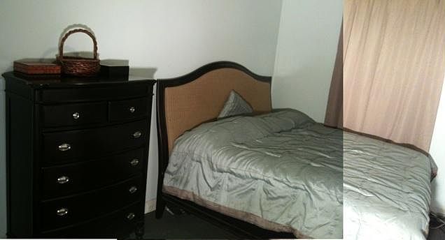 Large bedroom with TV, walk in closet