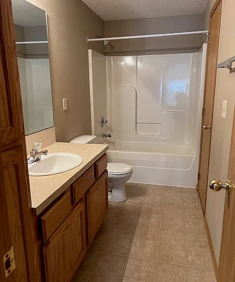 3rd bathroom (in basement with full bath/shower and full-height storage cabinet
