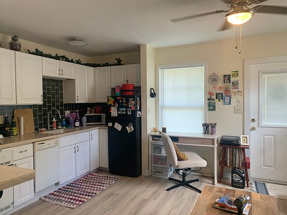 View from bedroom into kitchen/living room area