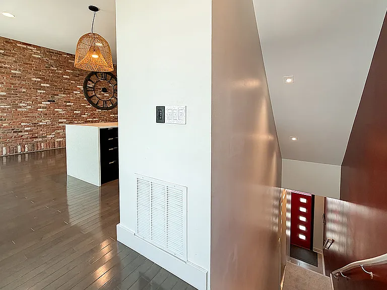 Stairwell Up to 2nd Level Living/ Dining/ Kitchen Area