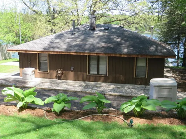12948 Sandyside Dr NE, Gowen, MI 49326