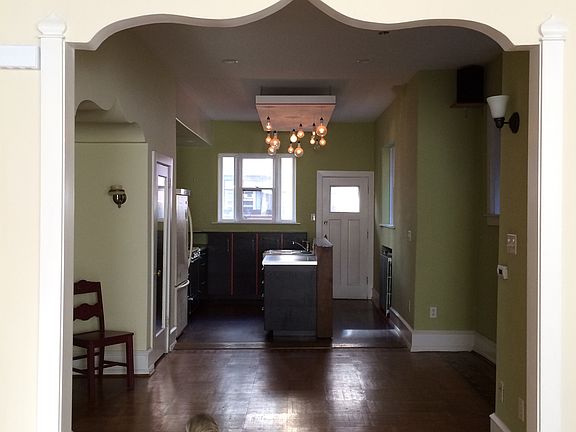 looking from living room through to dining area and kitchen