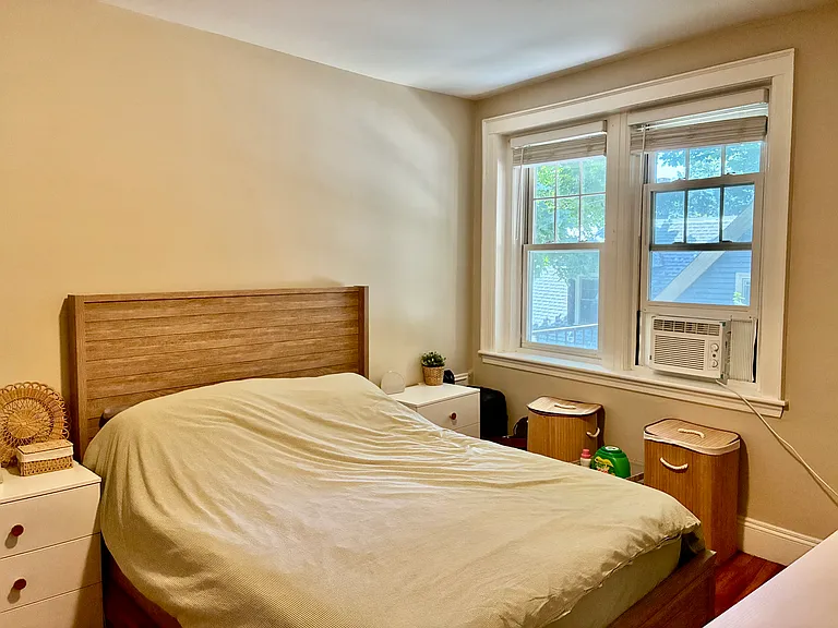 bedroom easily fits queen size bed, dresser, end tables, chair