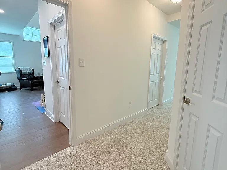 1st floor primary suite - its own separate wing of the home!