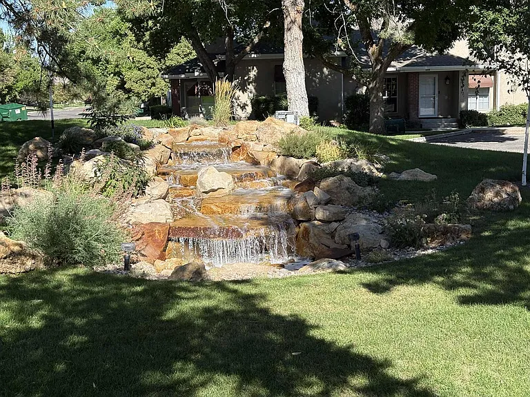 Common area landscaping water feature. The community is very well kept.