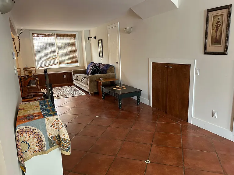 Wide hallway between living area and sleeping area