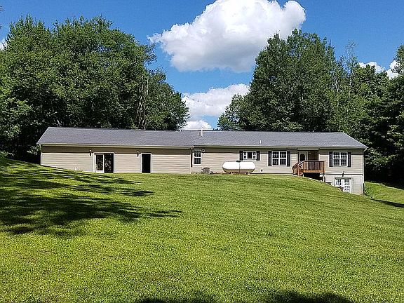 Rear from yard/woods edge.