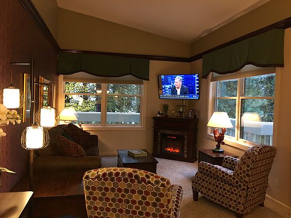 great den with fireplace