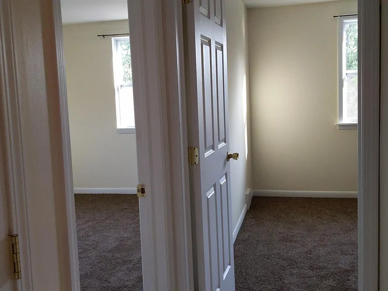 Hallway to two bedrooms