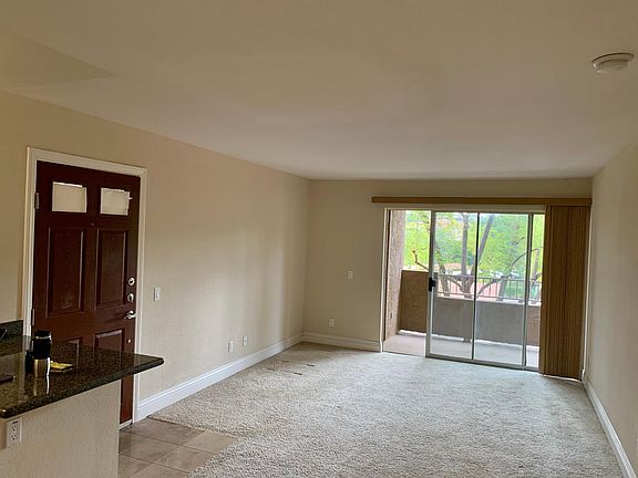 This photo shows the old carpet. Also the privacy glass in the front door has been improved.