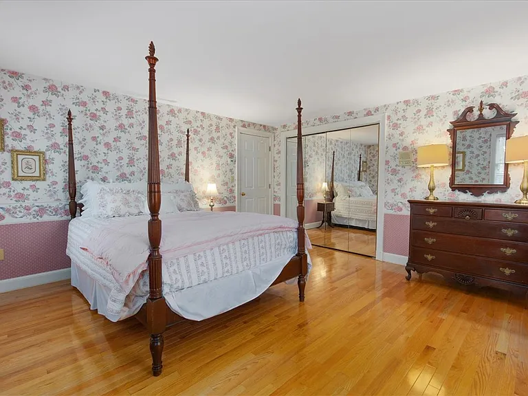 Guest bedroom 2 with 18th Century restored furniture and queen bed.