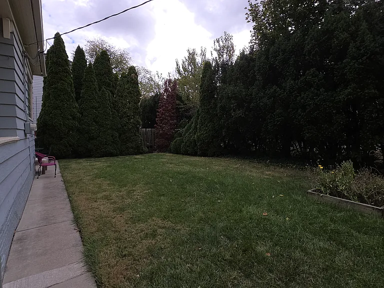 Backyard, lawn care included