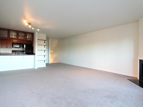 Open concept living area--upper level of unit