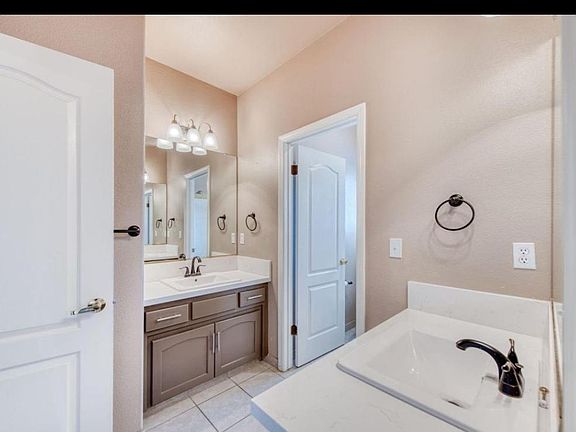 5th image of 9038 N Price Ave