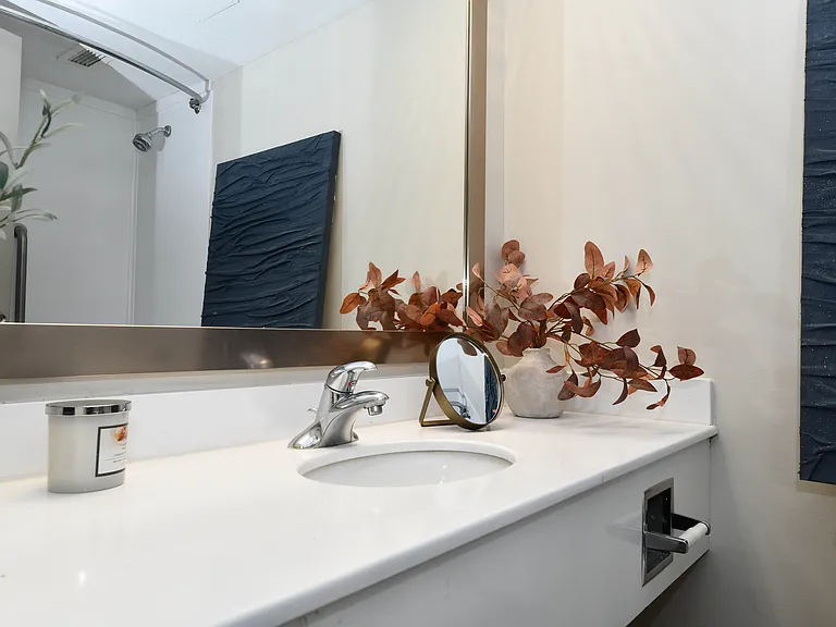 Bright bathroom with quartz counters