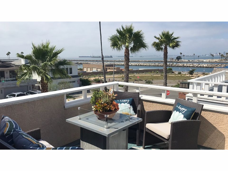 Front rooftop balcony with ocean views as well as marina, island and Mountain View's!