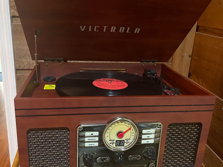 Record player with turntable, CD player and radio in the family room.