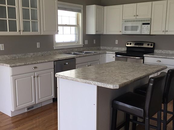 Kitchen with island and soft close drawers