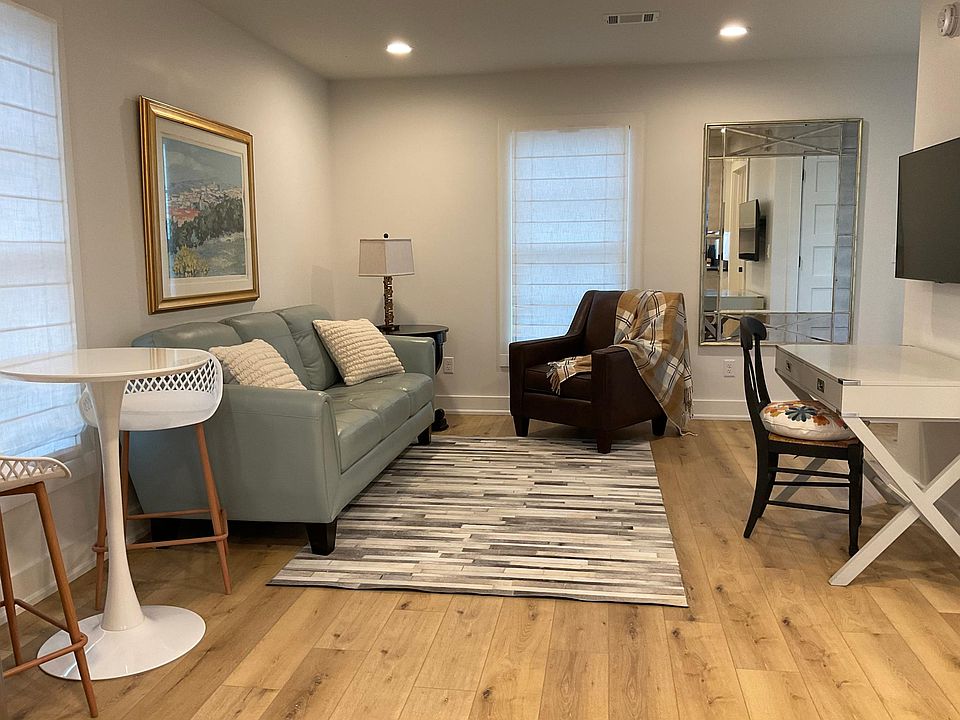 Living Room with dining table and chairs.
