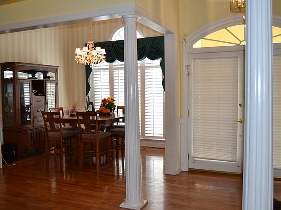 Acordian blinds on french doors