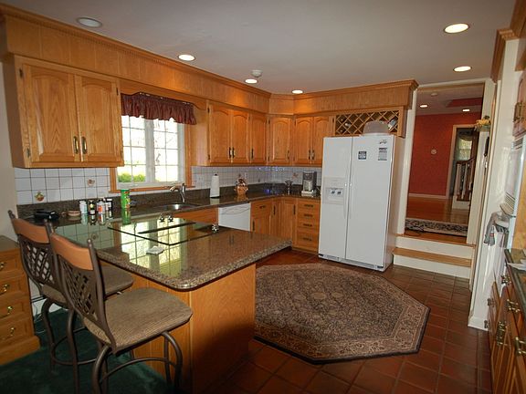 Kitchen - Tile floor, granite counters, tile backsplash