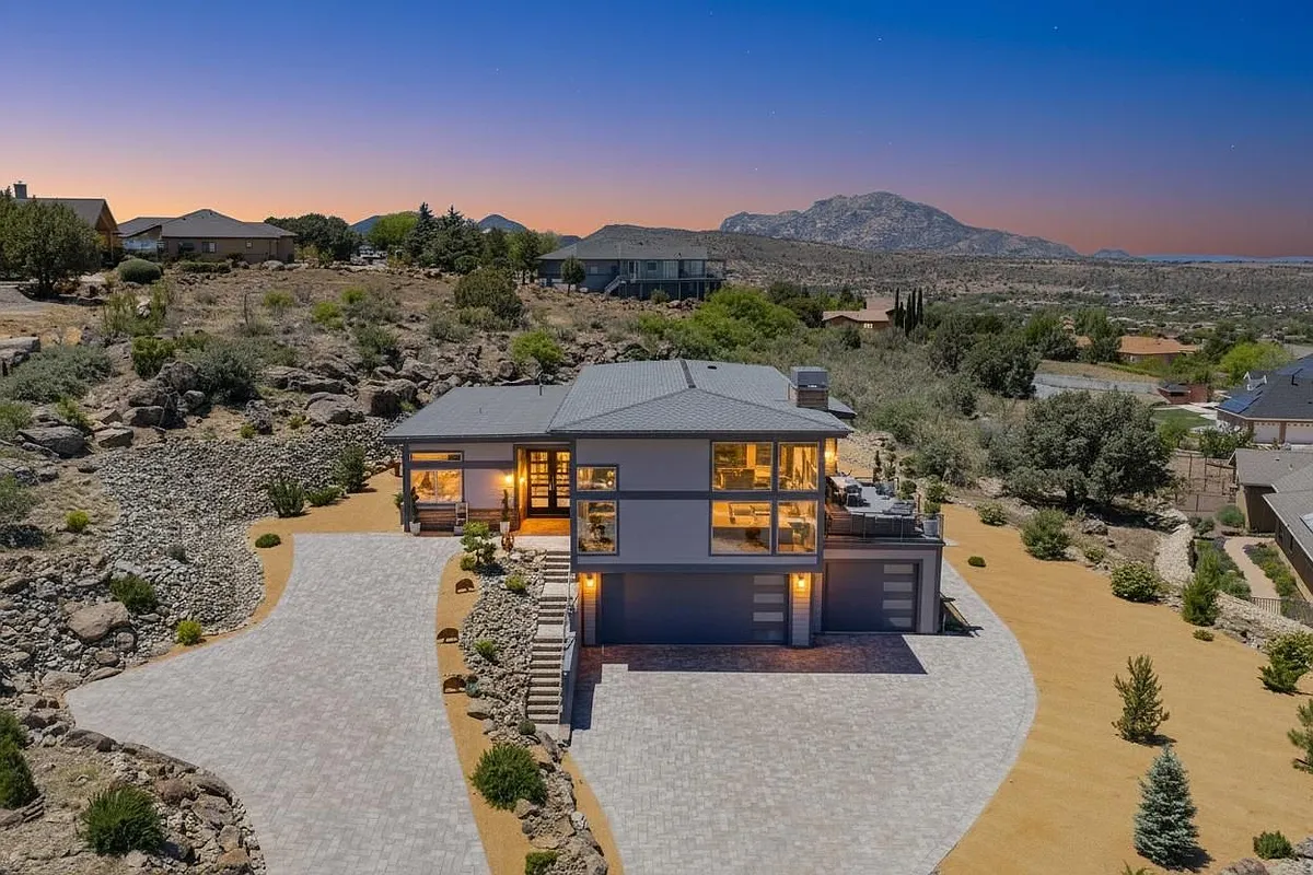 Drone view of home and land! 1.2 acres of serenity with phenomenal views. Granite Mountain in background for this view. 2 driveways make it easier for guests and renter to walk straight into home. Lower driveway into garage has stairs to home level... - 2640 Trail Walk