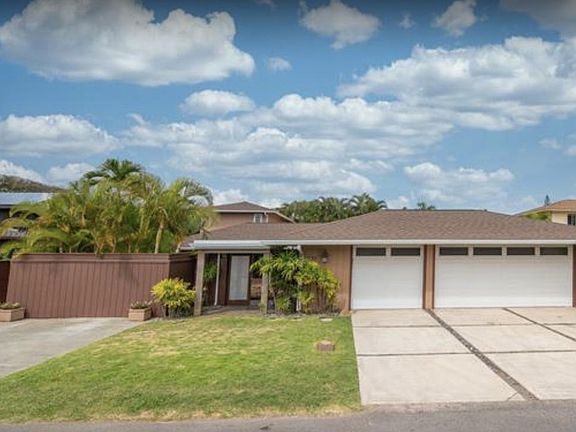Front of the home. The driveway on the left is your dedicated parking spot! And the open gate on the left side of the driveway is the entrance to the condo.