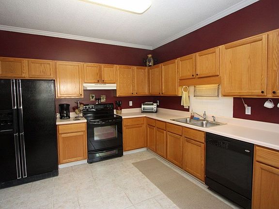 Open kitchen with lots of storage.