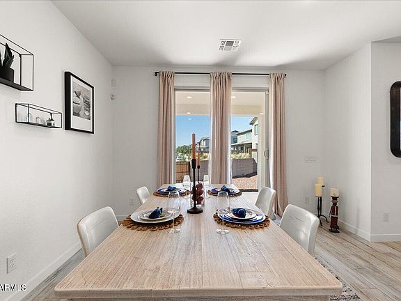 5th image of 15043 W DESERT BLOOM Street