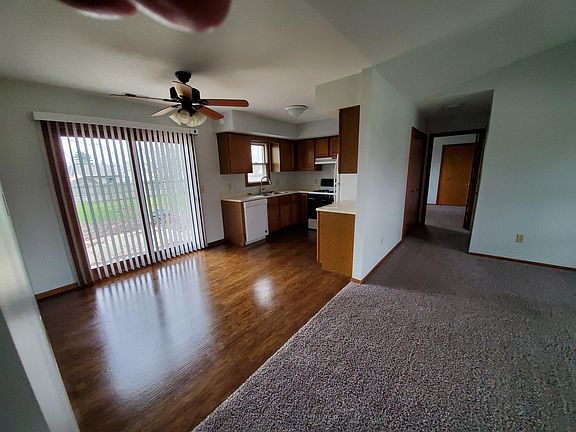 Kitchen with Eating Area and Hallway to Garage and Master Bedroom