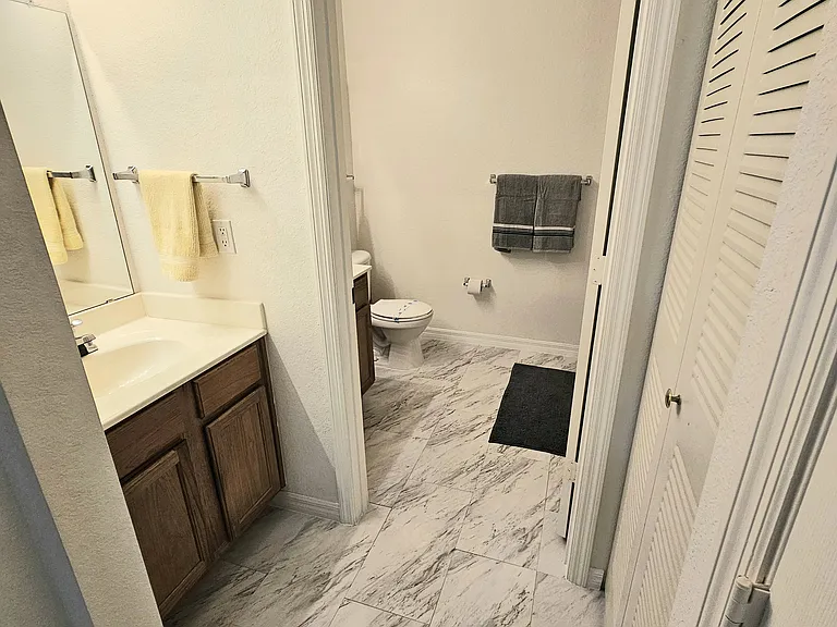 upstairs bathroom with extra sink outside