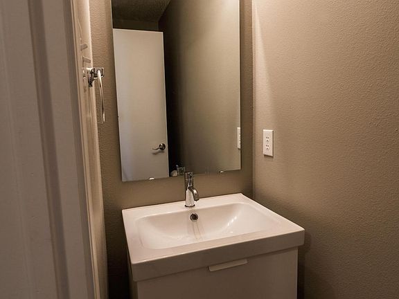 1/2 bath off of kitchen.