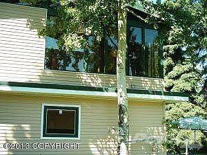 Side of home w/sunroom