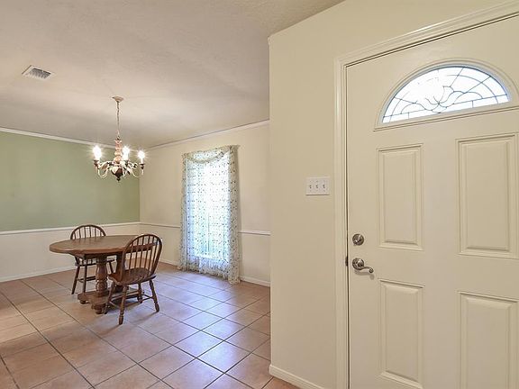 Formal dining area just off entry.
