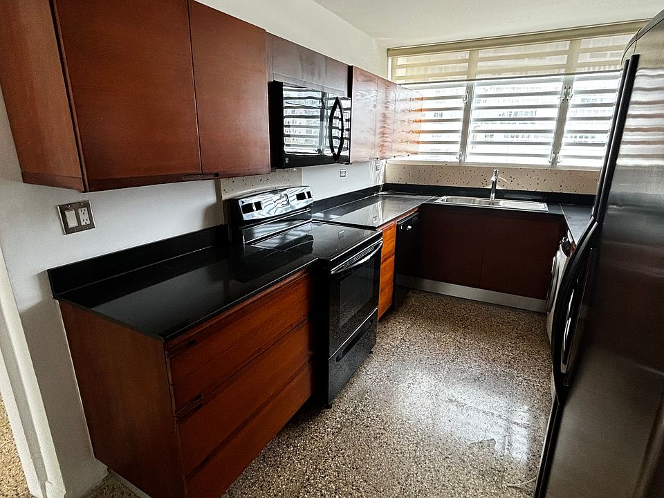 Kitchen view 2, with oven and microwave