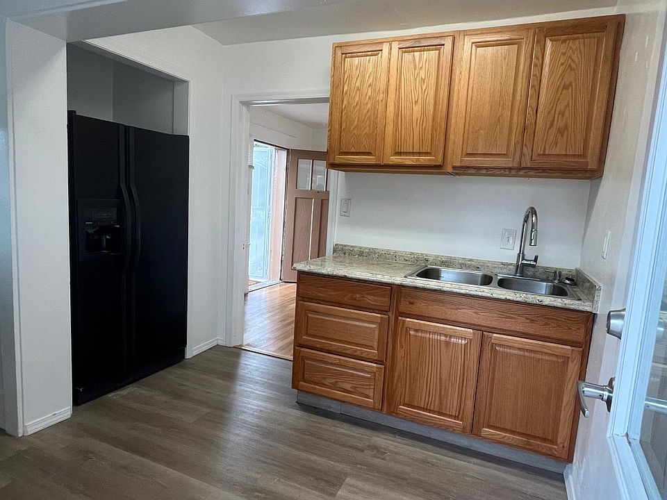 Kitchen looking to Living room