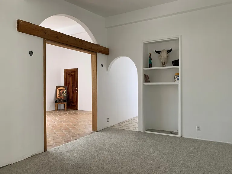 Living room into entertainers room and kitchen area