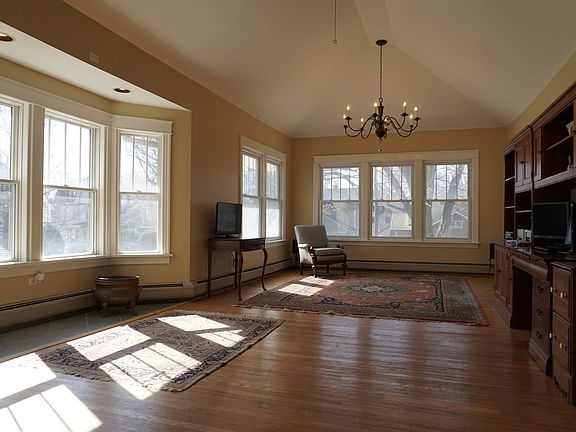 Hardwood floors have been refinished and large des