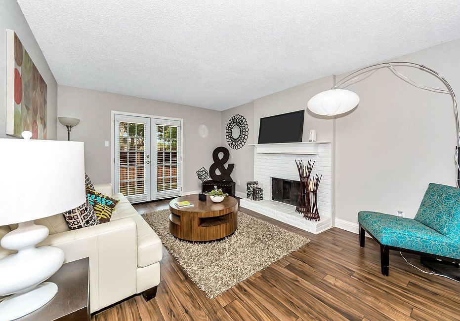 Open-concept living area with abundant natural light and flexible furniture layout options.