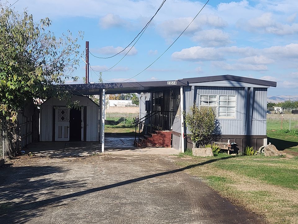 Covered parking and storage shed.