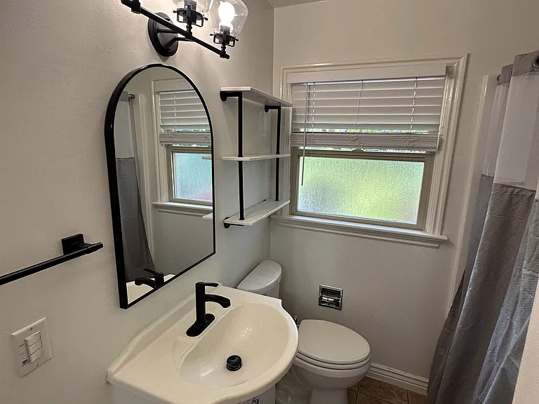 Upstairs bathroom vanity and toilet