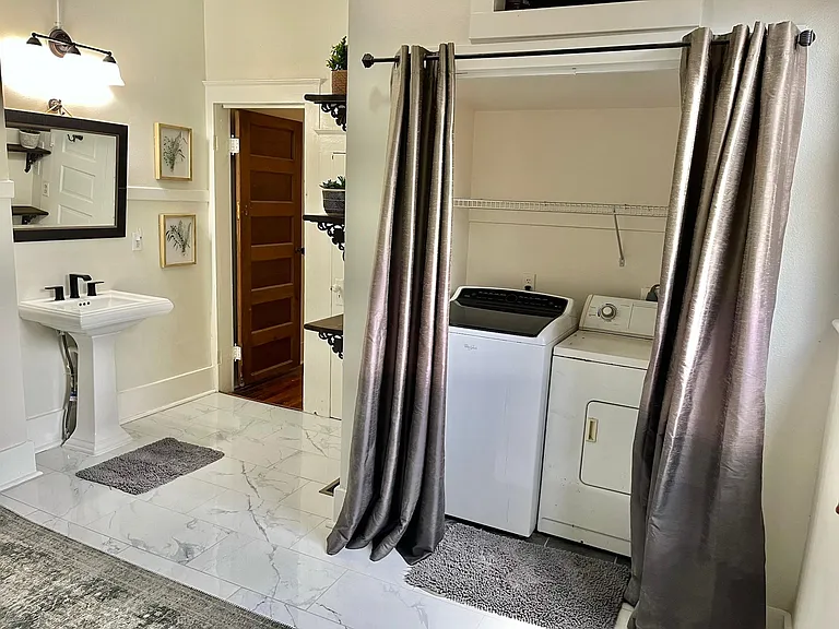 Laundry area in master bathroom