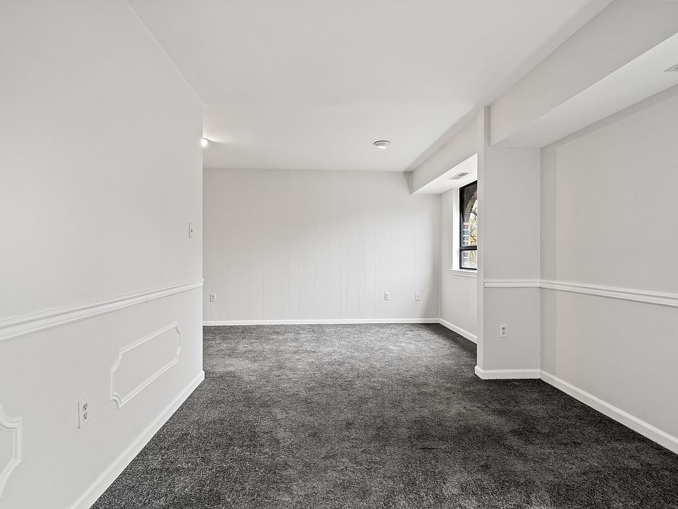 Formal Dining/Sitting Area looking into breakfast/dining area.