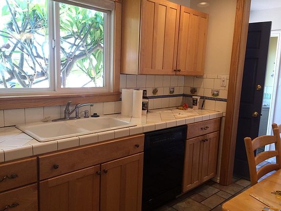 Kitchen with lots of cabinets.