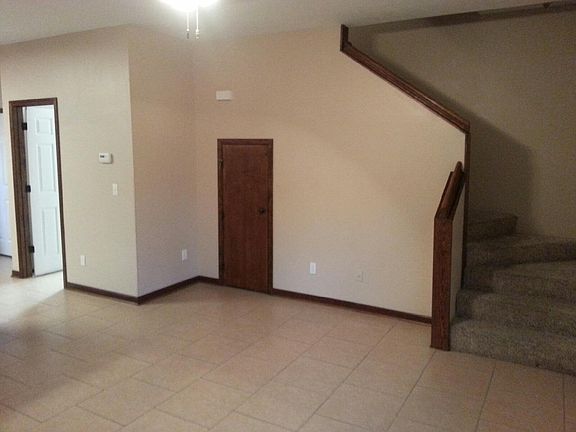 Living room staircase up to bedrooms
