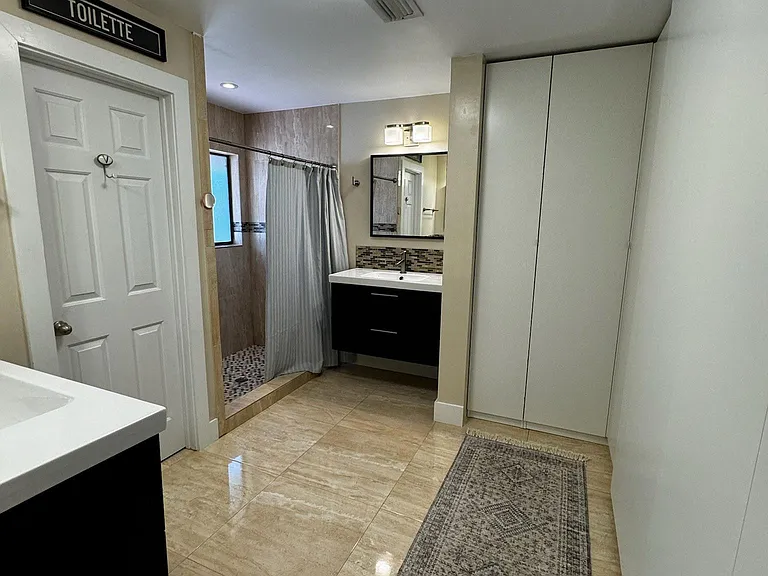 Master with shower and his and hers sinks + private toilet